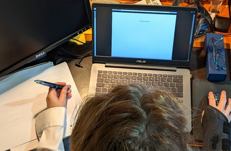 Photo of rheumatoid arthritis patient JG Chayko at her laptop working
